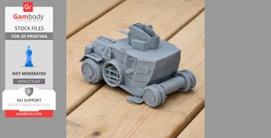 Gray 3D-printed model of a Daimler DZVR 21 tank on a wooden surface.