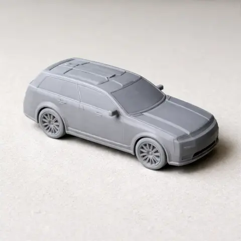 A gray 3D-printed model of a modern sedan car from Cyberpunk 2077.