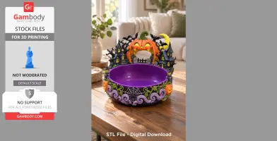 A Halloween-themed organizer bowl with pumpkins, bats, and haunted houses on a table.