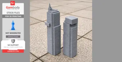 Two 3D-printed gray skyscraper models, standing on a tiled surface.