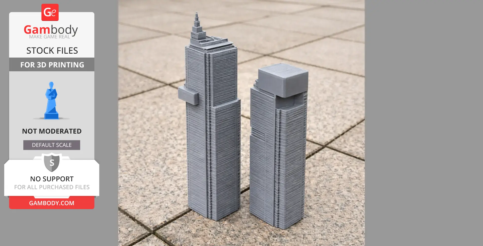 Two 3D-printed gray skyscraper models, standing on a tiled surface.