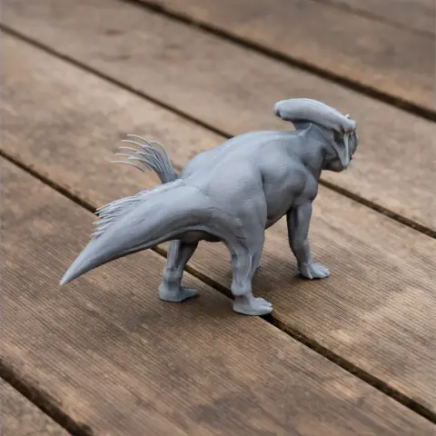 3D-printed Bagaceratops model with detailed back and tail, standing on wooden surface.