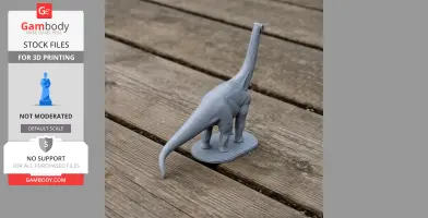 Gray 3D-printed dinosaur model with a long neck and tail on a wooden surface.