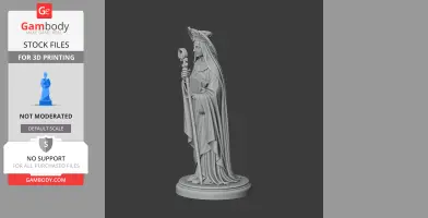 A detailed statue of a saint holding a staff and book, wearing a robe and headdress.