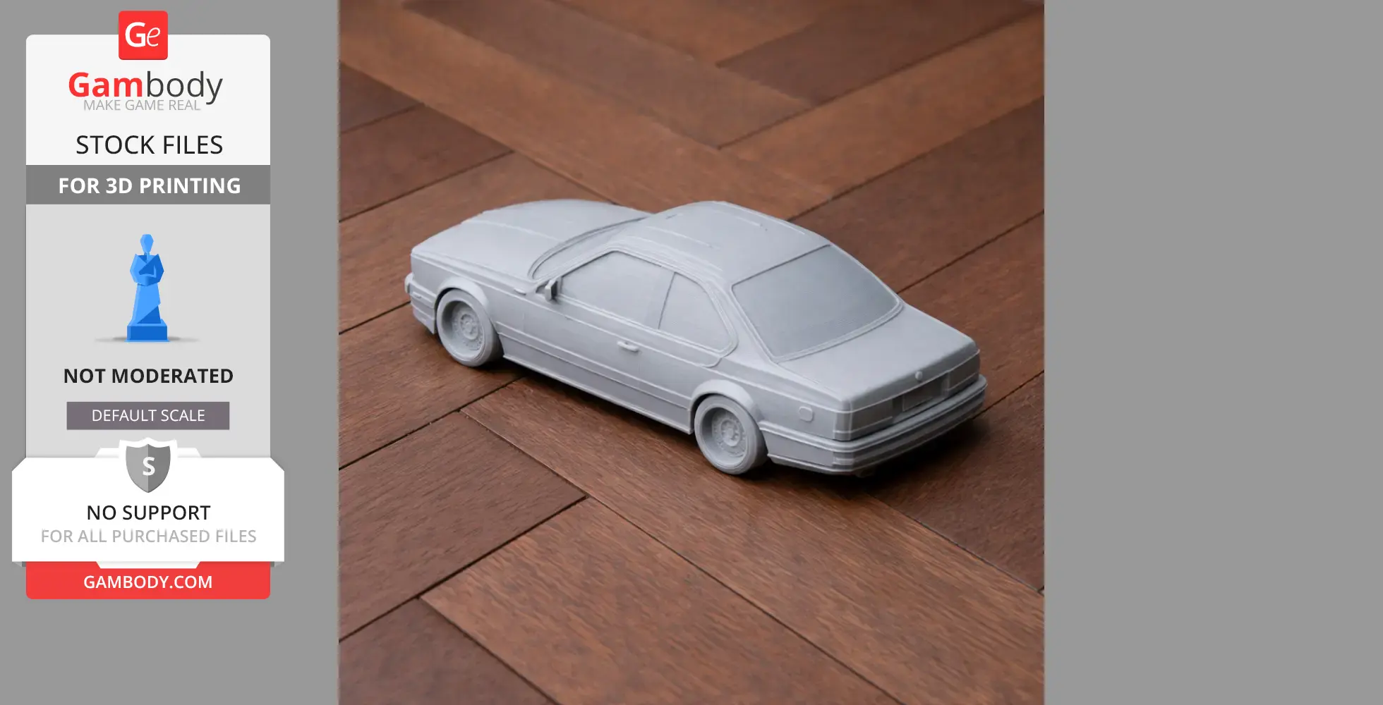 Gray 3D printed BMW E24 scale model on a wooden surface.