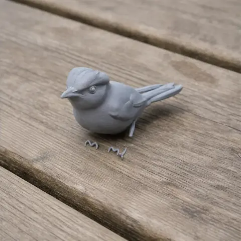 A 3D-printed model of a small, prehistoric bird with detailed feathers, on a wooden surface.