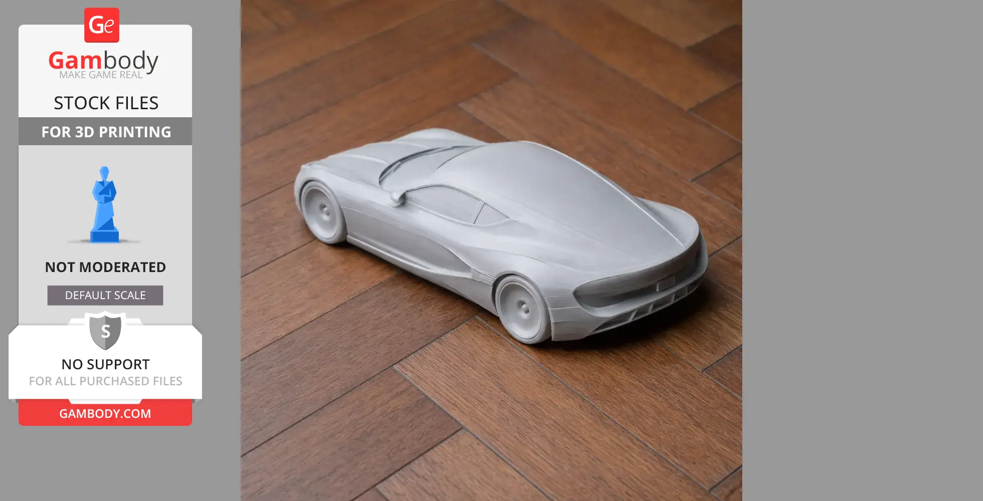 A sleek, gray 3D-printed model of a sports car on a wooden floor.