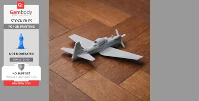 A 3D-printed model of a vintage aircraft with detailed wings and propeller on a wooden surface.