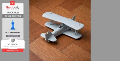 3D printed model of a Curtiss F7C Seahawk biplane on a wooden surface.
