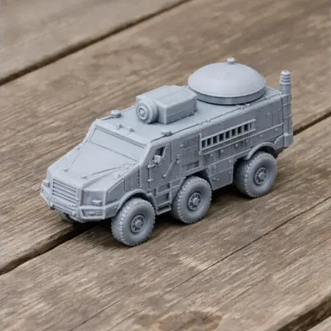 Gray 3D-printed model of an armored personnel carrier with six wheels and detailed surface features.