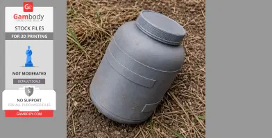 A 3D-printed gray jar with a screw cap, lying on dry grass and earthy ground.