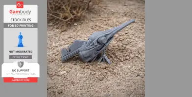 3D printed swordfish skull model displayed on sandy ground.