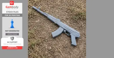 A 3D-printed AK-74M cosplay prop lies on rocky ground.