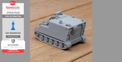 Gray 3D printed model of an armored treatment vehicle with tracks and detailed surface features.