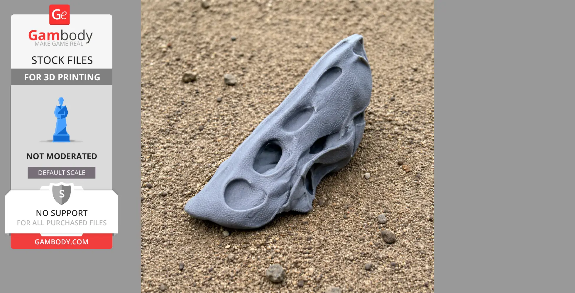 A gray 3D printed Therapsida skull replica is resting on sandy ground.