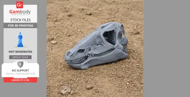 Gray 3D printed Thescelosaurus skull replica placed on a rocky surface.