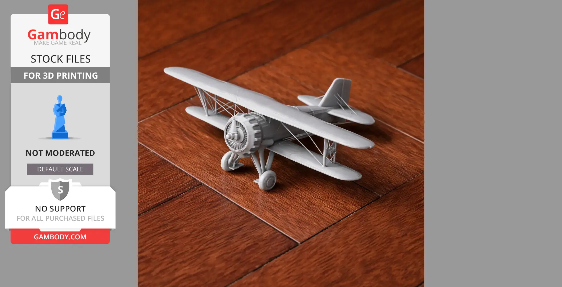 Gray 3D-printed Curtiss biplane model on a wooden surface.