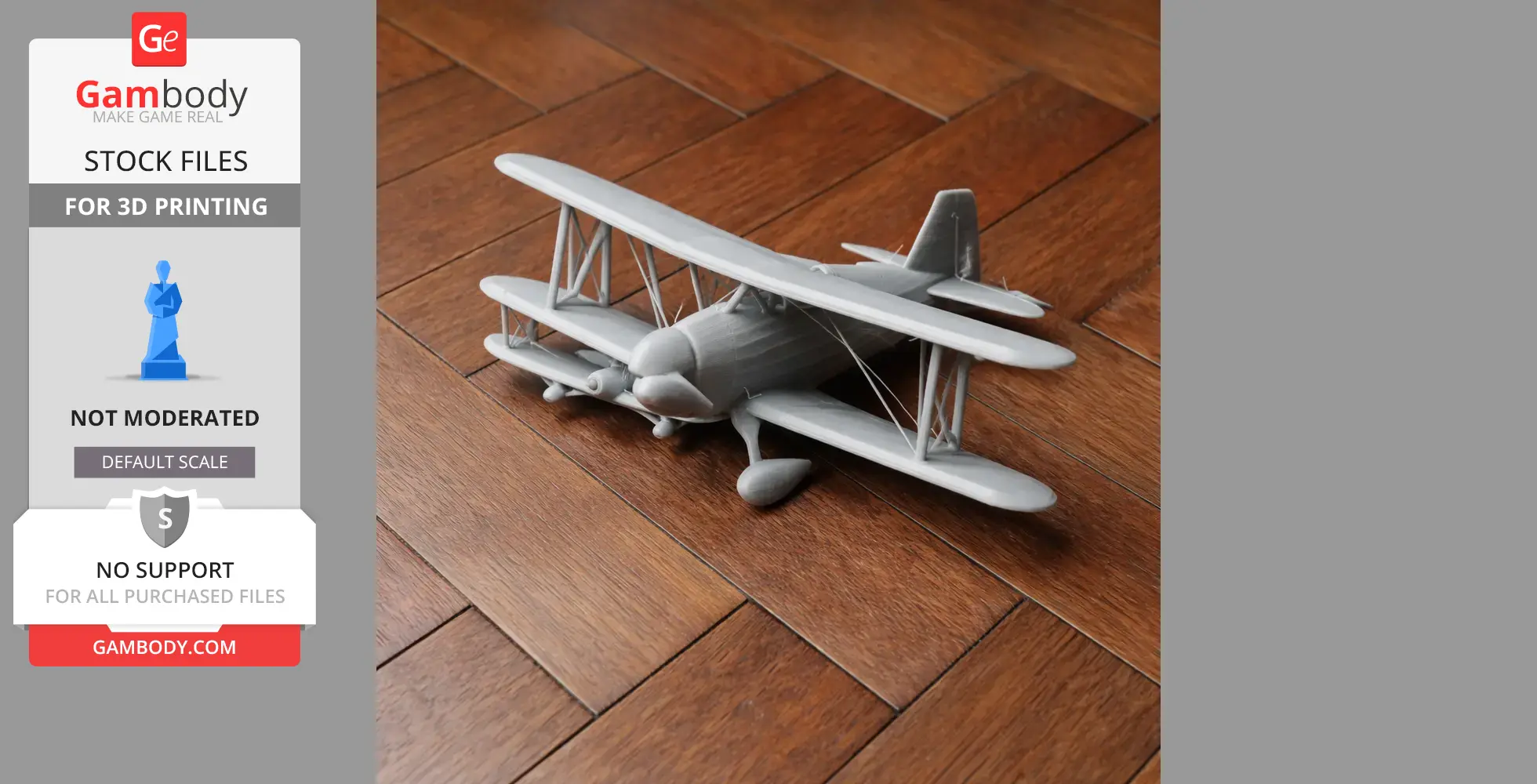 A detailed 3D printed model of a biplane on a wooden floor.