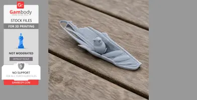 3D-printed prehistoric bird model nestled in a stylized leaf structure on wooden surface.