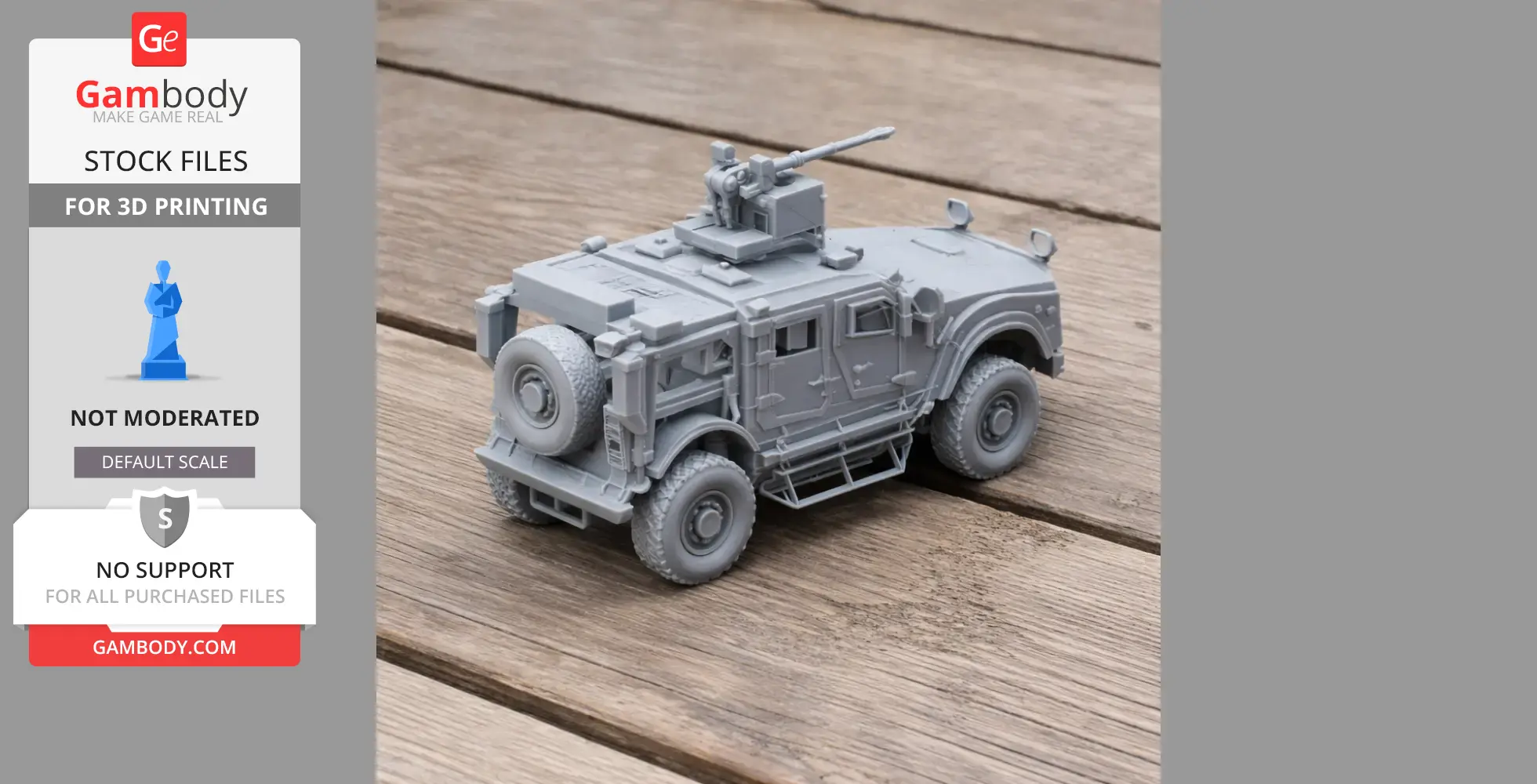 A detailed gray 3D-printed model of a mine-resistant ambush protected vehicle on a wooden surface.