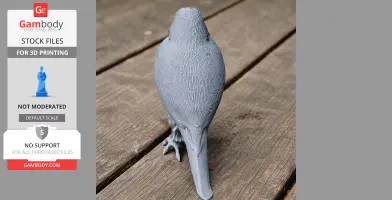 Gray 3D-printed model of a bird viewed from the back, placed on a wooden surface.