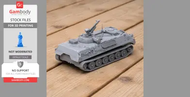 Gray 3D-printed model of an MT-LBu tank displayed on a wooden surface.
