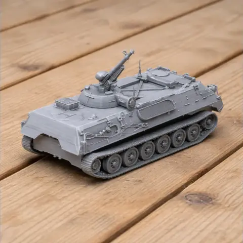3D-printed MT-LBu tank model on wooden surface, detailed with tracks and turret.