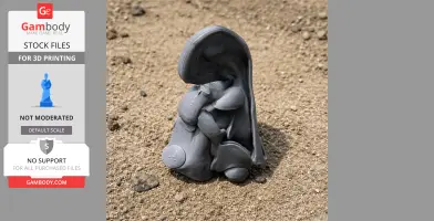 Gray 3D-printed Tlatolophus skull model on sandy ground.