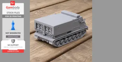 Gray 3D-printed model of a multiple rocket launcher tank on wooden surface.