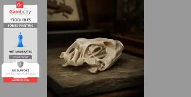 3D printable Tokay gecko skull replica on a stone-like surface.