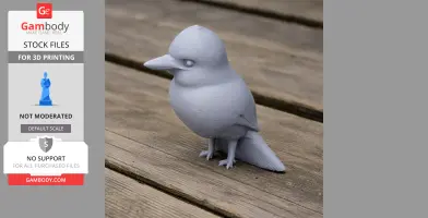 Gray 3D printed model of a bird with a rounded body and beak, standing on a wooden surface.