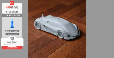 3D printed Devel Sixteen model car in gray, displayed on a wooden floor.