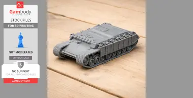 Gray 3D-printed model of a Nakpadon tank on a wooden surface, showing detailed tracks and body design.