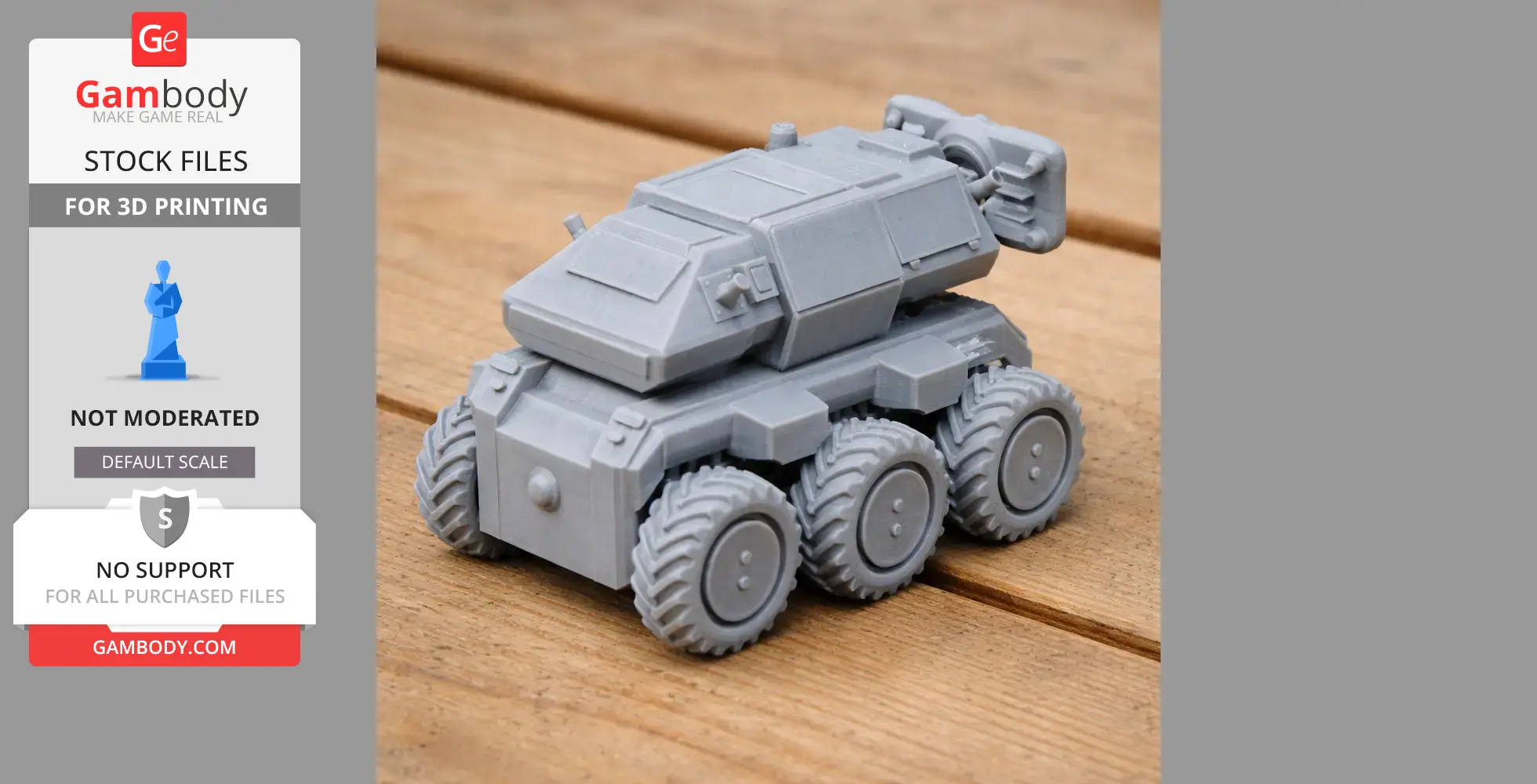 A six-wheeled, gray 3D-printed tank model with an angular body on a wooden surface.
