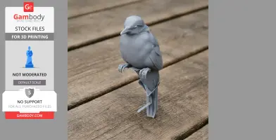 A detailed gray 3D-printed model of a bird perched on a branch, on a wooden surface.