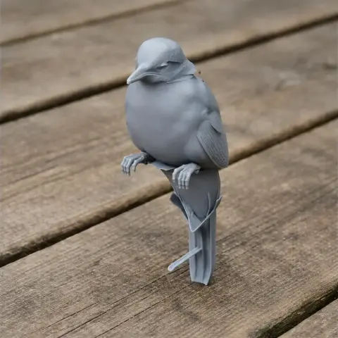 A 3D printed model of a bird perched on a stand, detailed feathers and texture visible.
