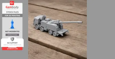 A 3D printed model of a B-52 tank on a wooden surface, showcasing detailed artillery and wheels.