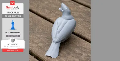 3D-printed model of a bird, likely a Bannerman's turaco, on a wooden surface.