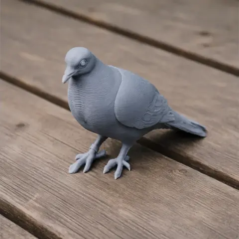 A detailed 3D-printed model of a bar-shouldered dove on a wooden surface.