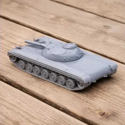 Gray 3D-printed model of a tank with a sleek design and visible turret, resting on a wooden surface.