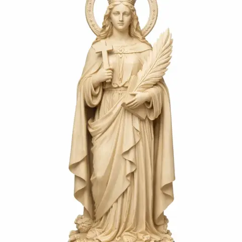 A serene statue of a saint holding a cross and palm, adorned with a halo, in flowing robes.