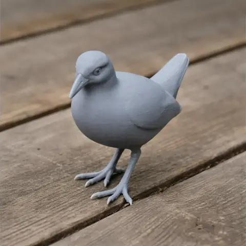 Gray 3D-printed model of a Bar-winged rail bird, standing on a wooden surface.