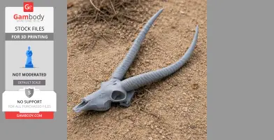 A 3D-printed waterbuck skull replica with long, curved horns on sandy ground.