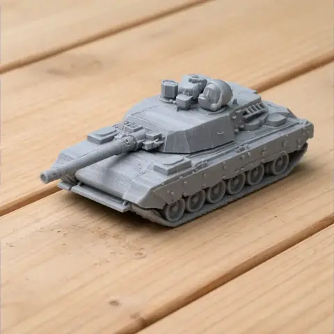 Gray 3D-printed model of a detailed tank with a long barrel and turret, placed on a wooden surface.