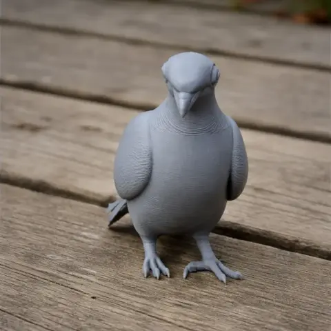 A 3D-printed model of a bare-eyed pigeon standing on a wooden surface.