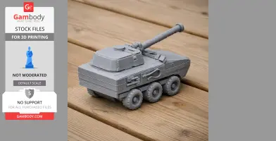 A 3D-printed gray tank model with a turret and cannon on a wooden surface.