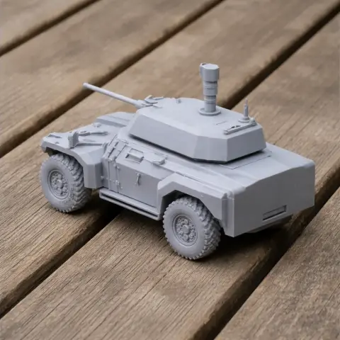 3D-printed model of a tank with four wheels and a turret, on a wooden surface.