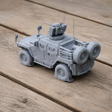 3D-printed Otokar Cobra tank model on a wooden surface, showcasing its detailed design.