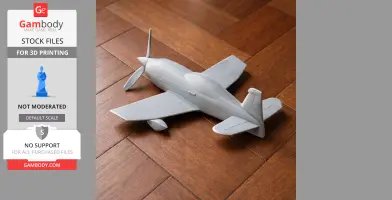 A 3D-printed model of the Extra EA-300 airplane on a wooden floor.