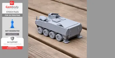 Gray 3D-printed model of Pandur II tank on wooden surface, featuring detailed wheels and turret.
